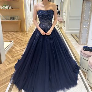 チュールでかわいさとネイビーという締め色で大人ぽさ